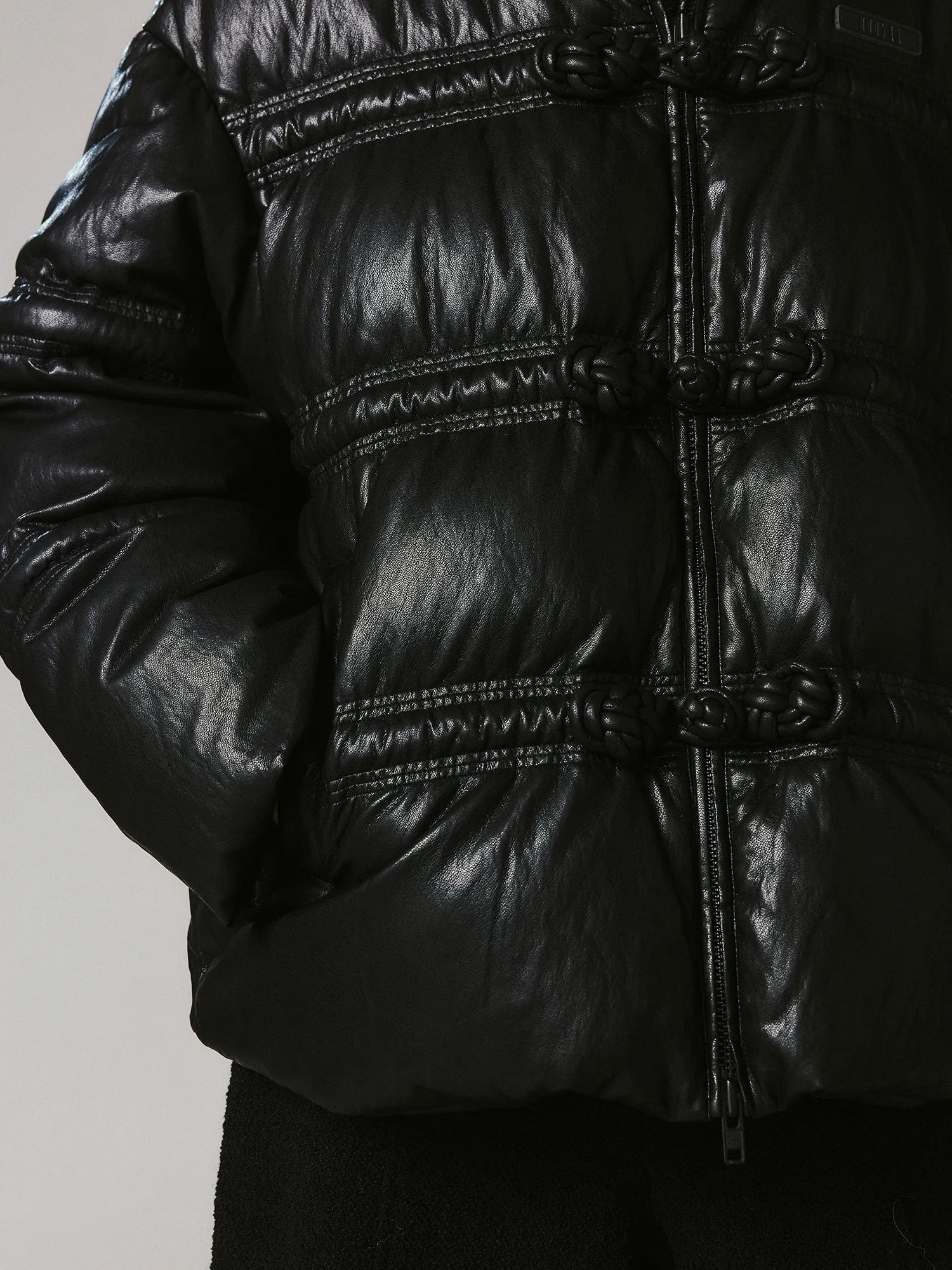 3D laced toggle PU puffer jacket