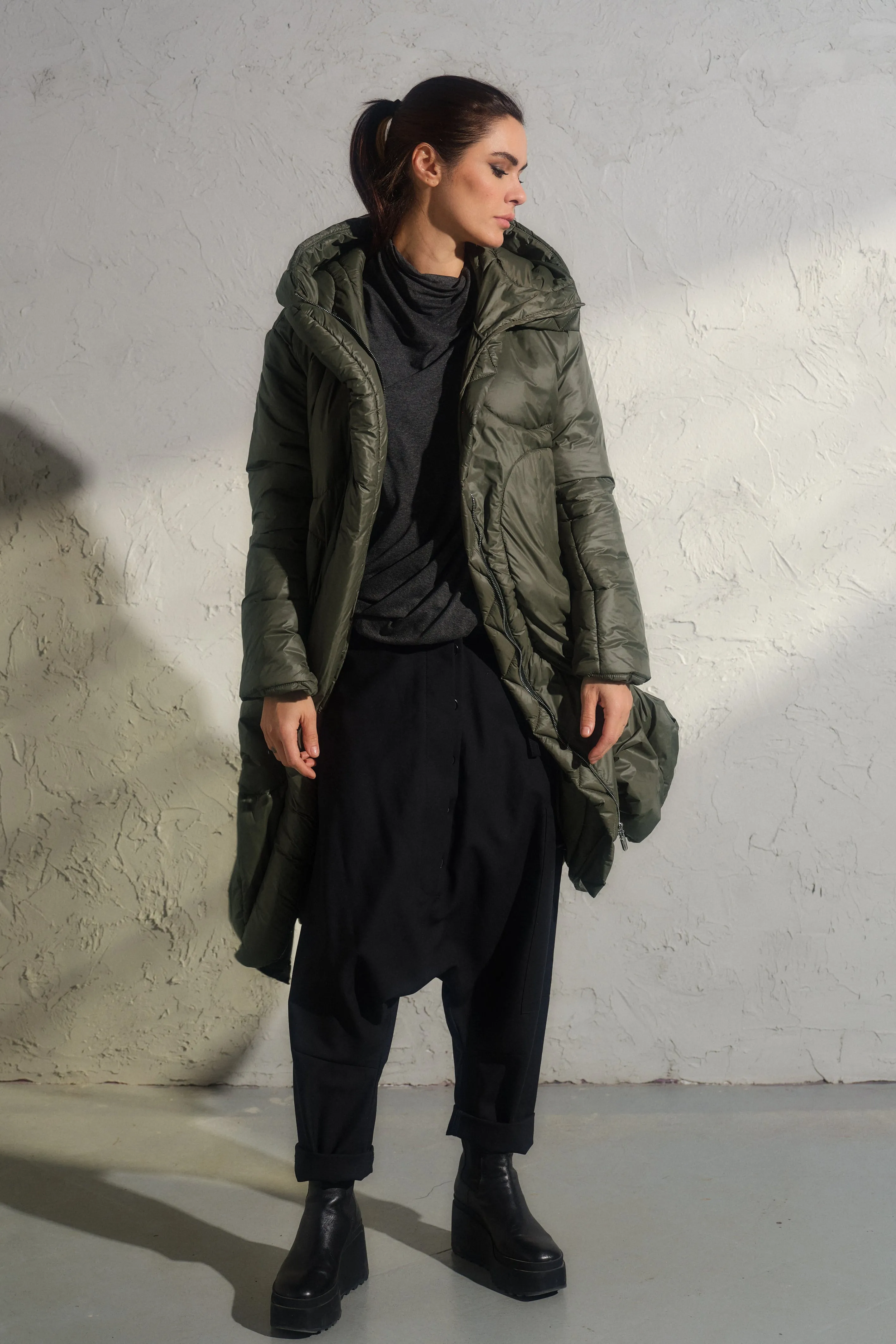 Avant garde transitional puffer jacket with hood