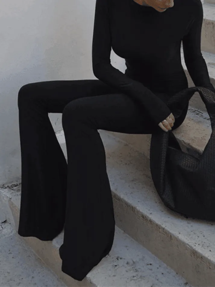 Uniwim Backless Long Sleeve Flare Leg Jumpsuit