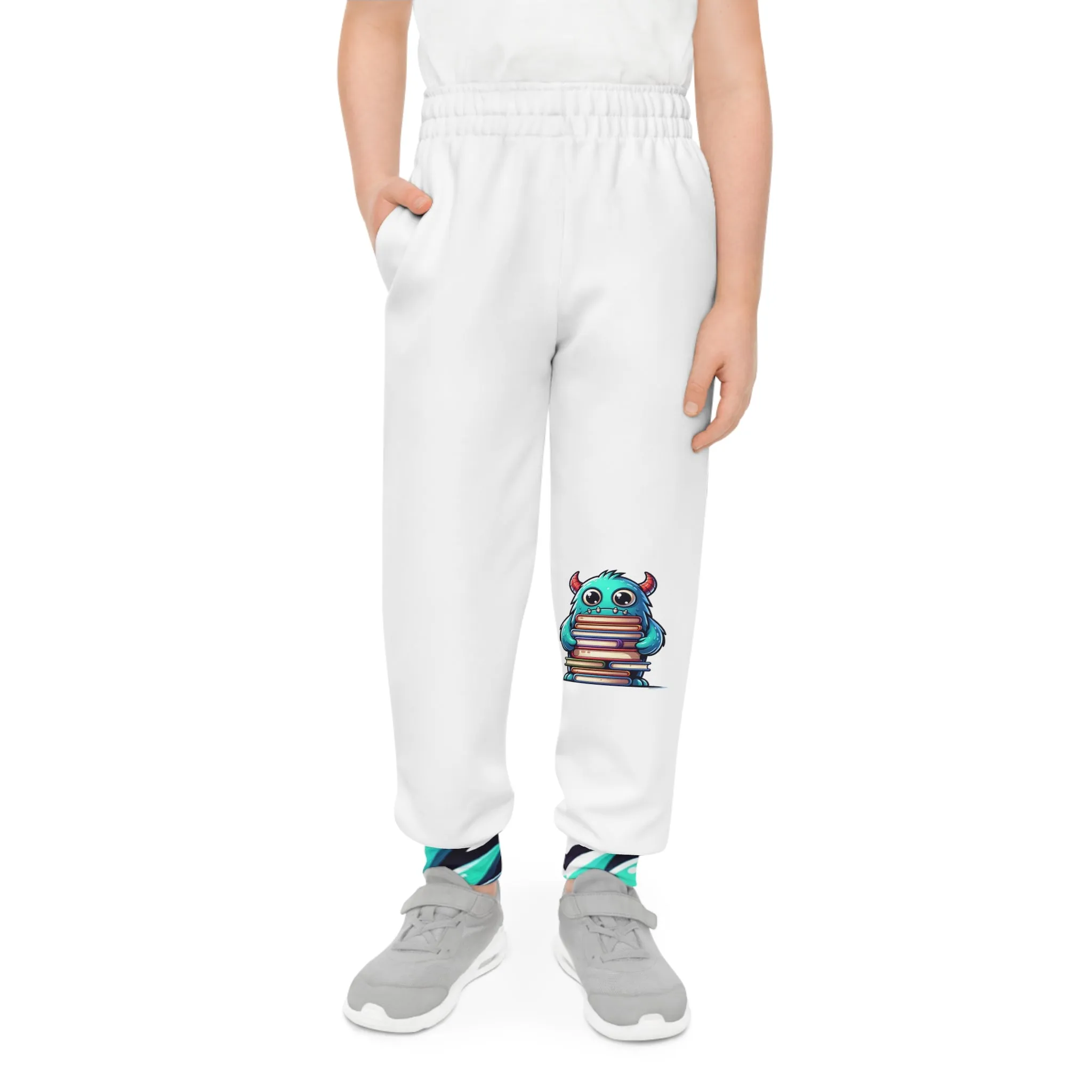 Youth Joggers (AOP) with Cute Blue Monster Holding Books - Fun & Empowering Design